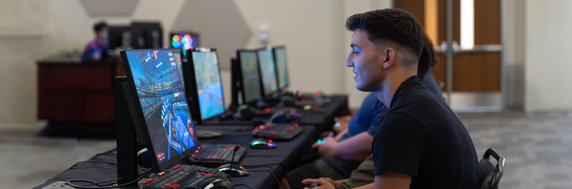 Students compete against one another in an esports tournament.